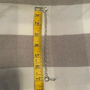 Origami owl bracelet with owl charm.